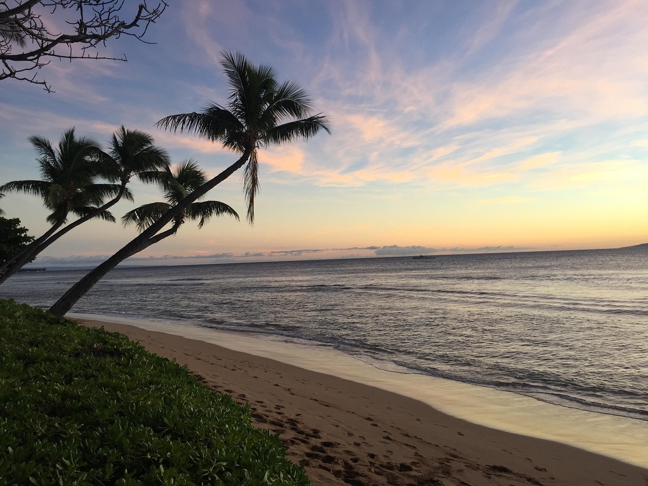  Image of beach in Hawaii with the blue ocean.