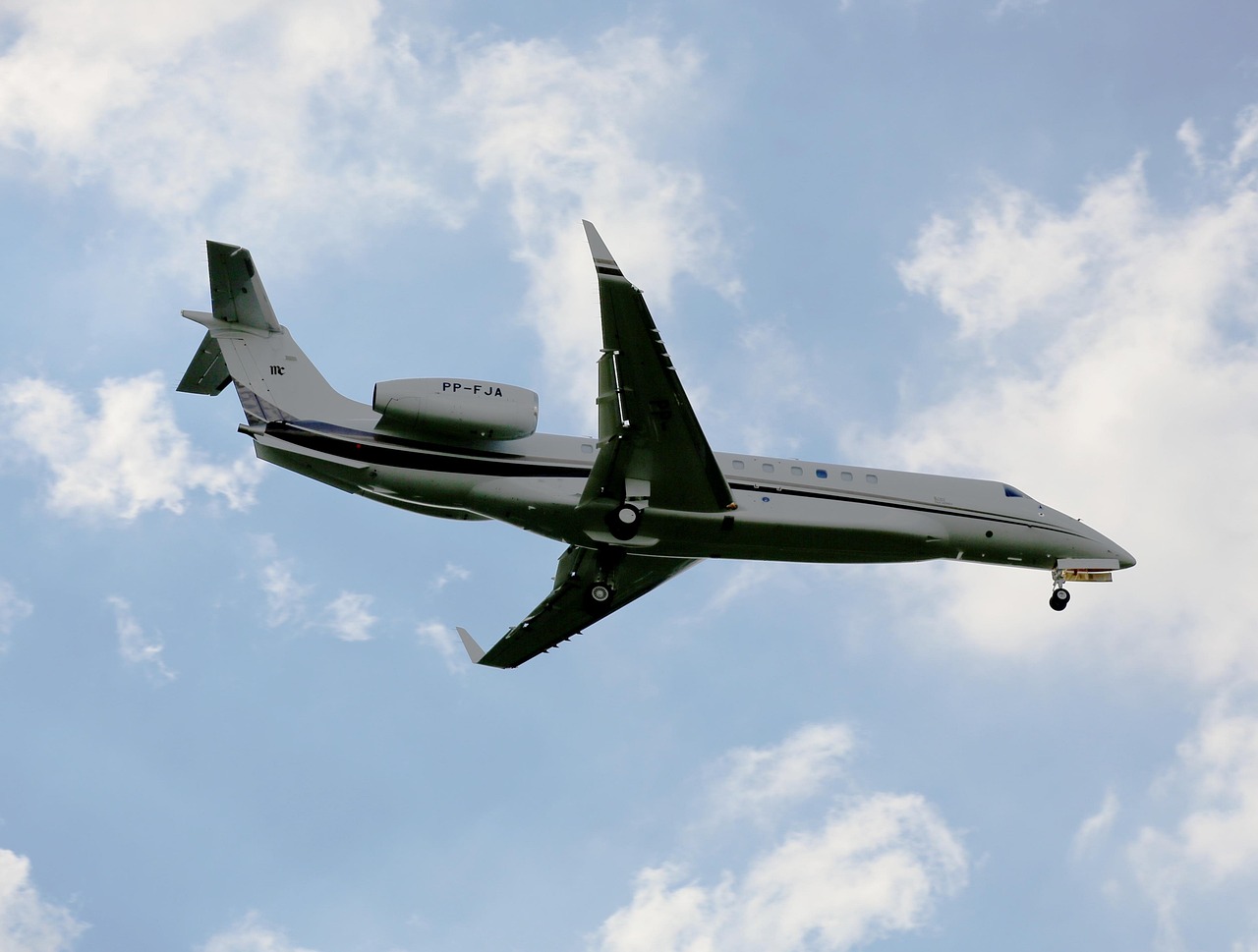  Image of a private jet turning to land.